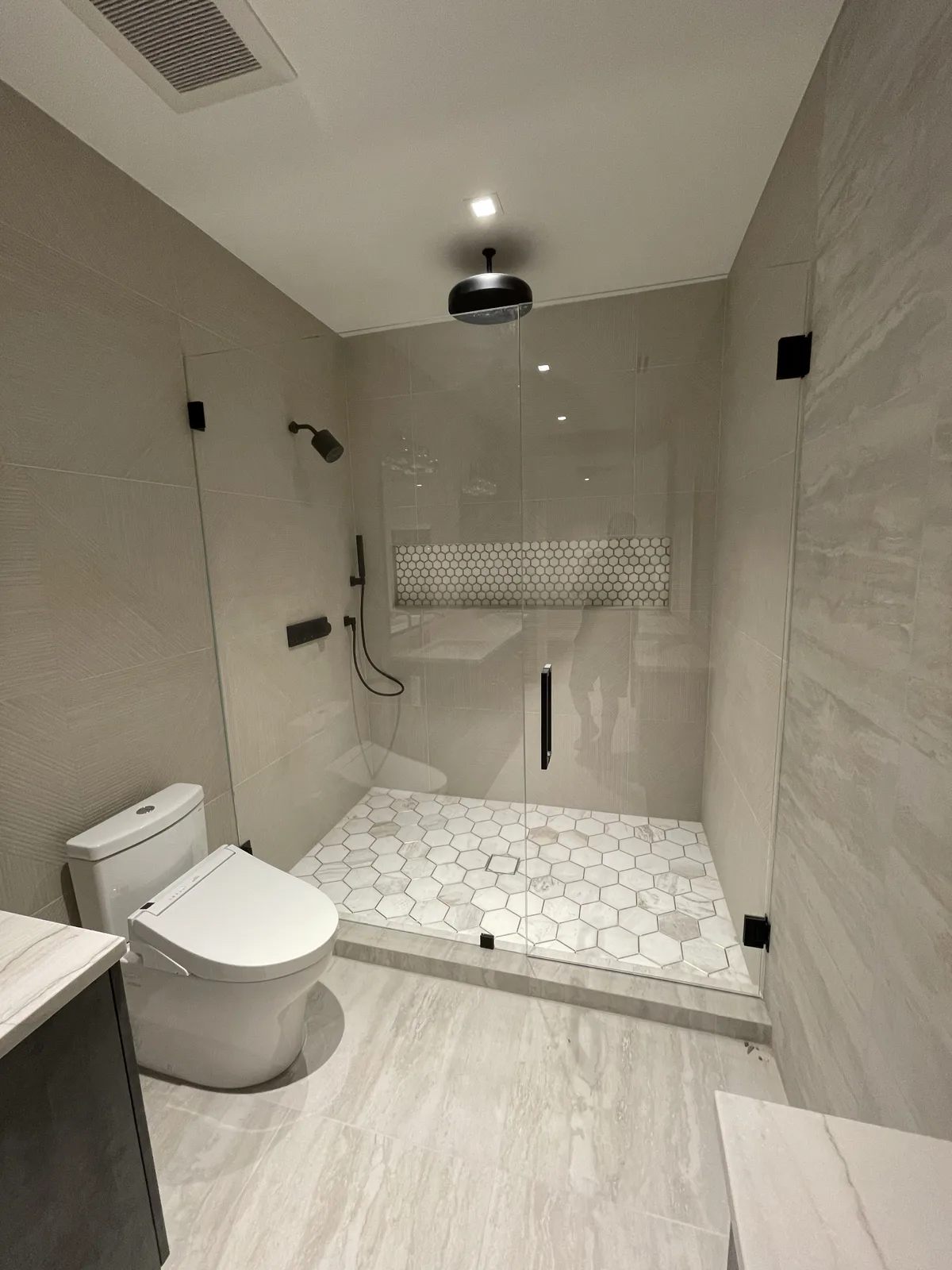 Completed bathroom remodel in Broward County, FL by R&R Repair & Remodel