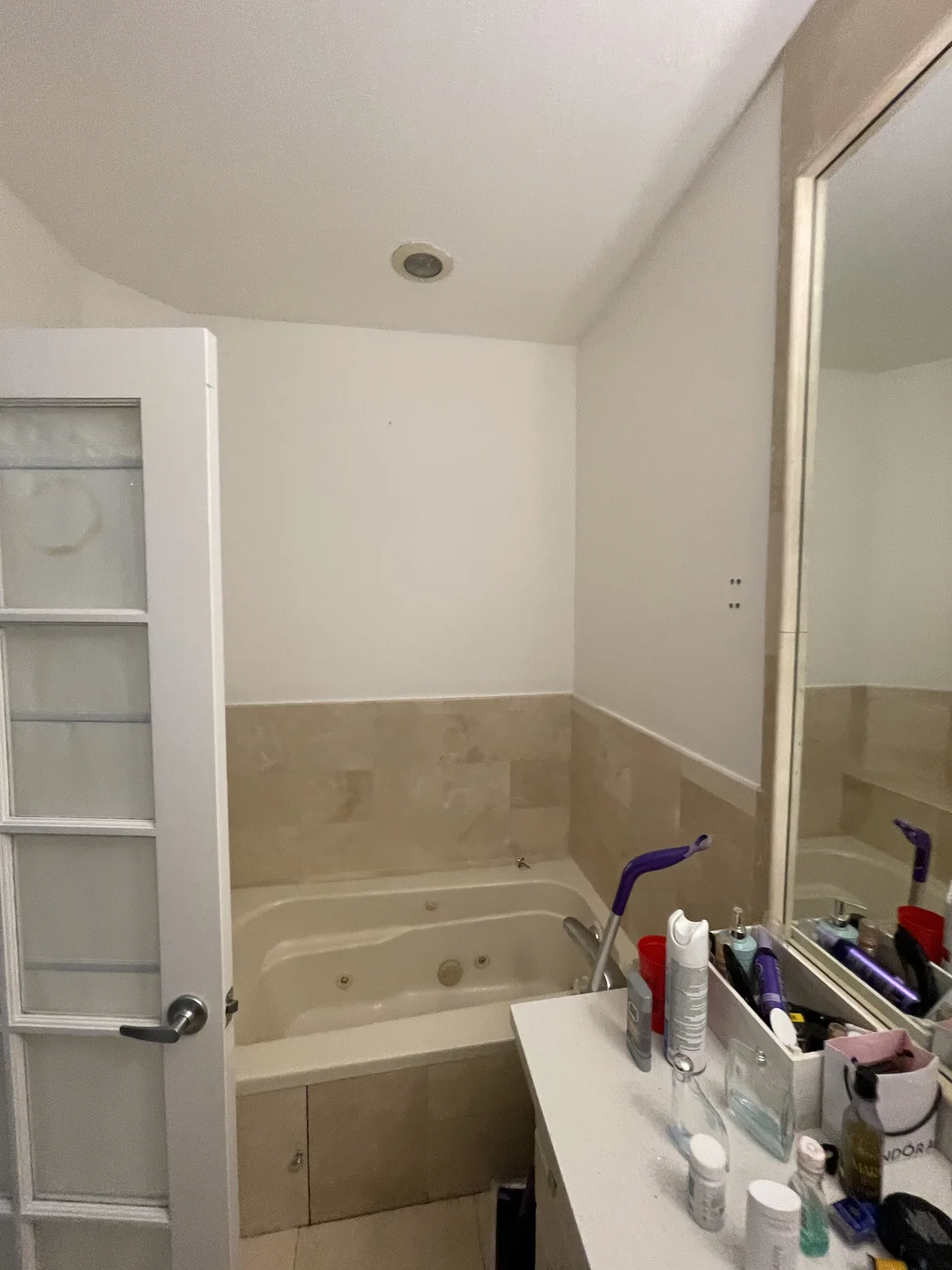 Cramped 1950s master bathroom before R&R remodel in Fort Lauderdale, FL